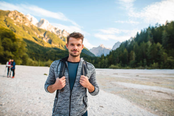 portrait of contented male hiker in northwestern slovenia - sport exercising men julian alps imagens e fotografias de stock