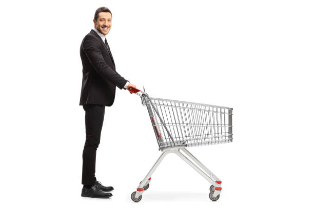 Businessman with an empty shopping cart