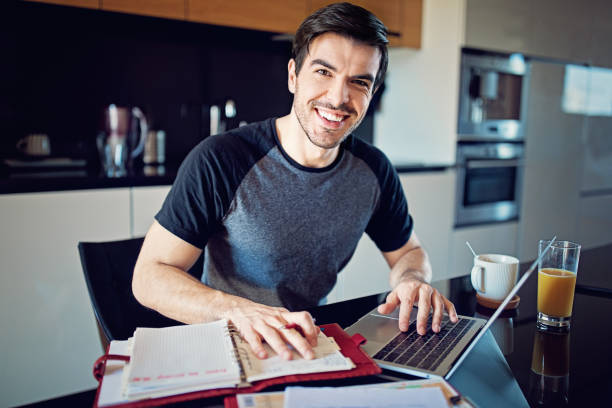 istock Portrait of man working at home 1220013193