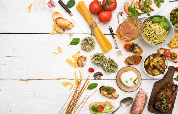 istock Dinner table. Italian food and ingredients with copy space 1220016246