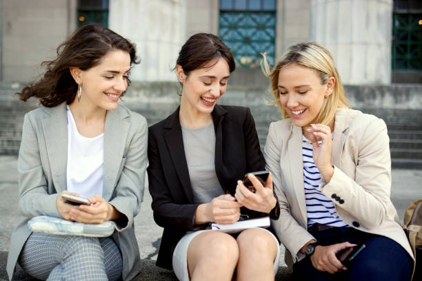 istock Group of university students friends, talking and having fun 1220018816