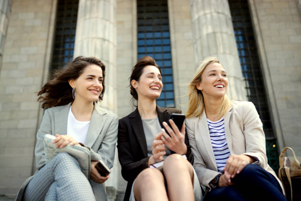 istock Group of university students friends, talking and having fun 1220020381