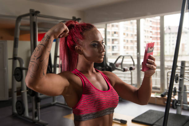 istock Girl Taking Selfie Picture In Gym 1220021368