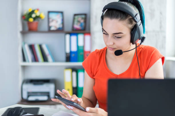 istock Female teacher working from home online 1220022061