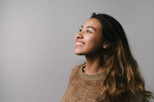 istock Smiling woman looking to the side 1220023066