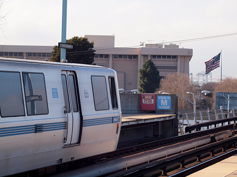 West Oakland, California - January 30, 2011: BART Train heading to Dublin / Pleasanton pulls into West Oakland station in the middle of the day taken January 31, 2011.