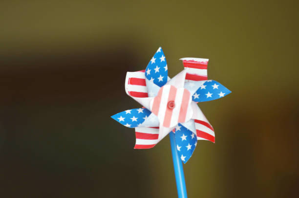 istock Toy paper windmill flag patterned United States 1220028857