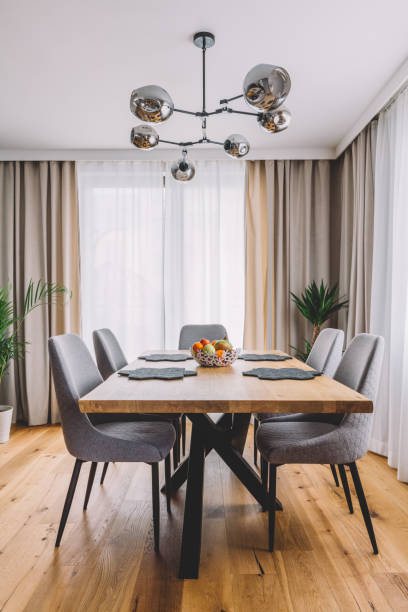 istock Dining room with wooden table and floor in modern apartment. 1220036866