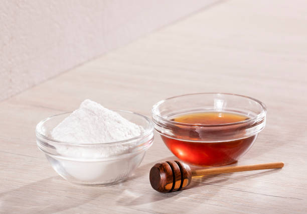 istock Honey and baking soda mask to remove stains 1220039641