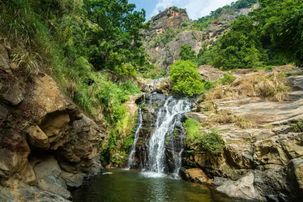 Photo of Beautiful view of Ravana Falls a popular sightseeing attraction in Ella a mountain town in the central highland of Sri Lanka.