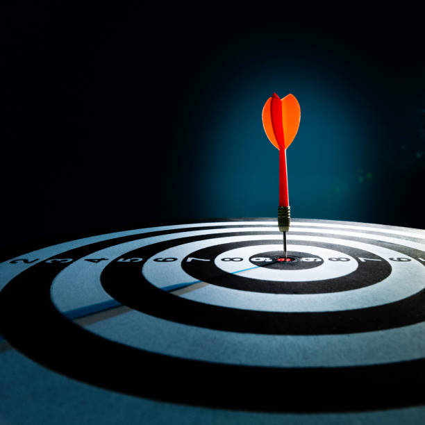 Close up of dart on target