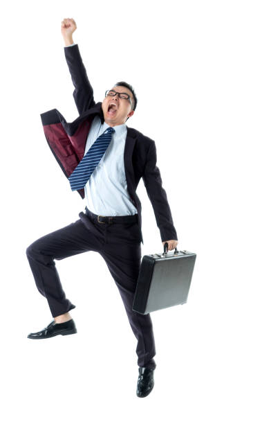 istock Cheerful businessman jumping on white background 1220045604
