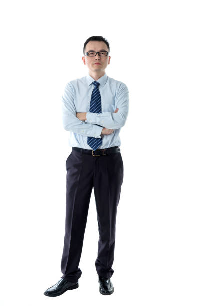 istock Businessman standing with arms crossed 1220045641