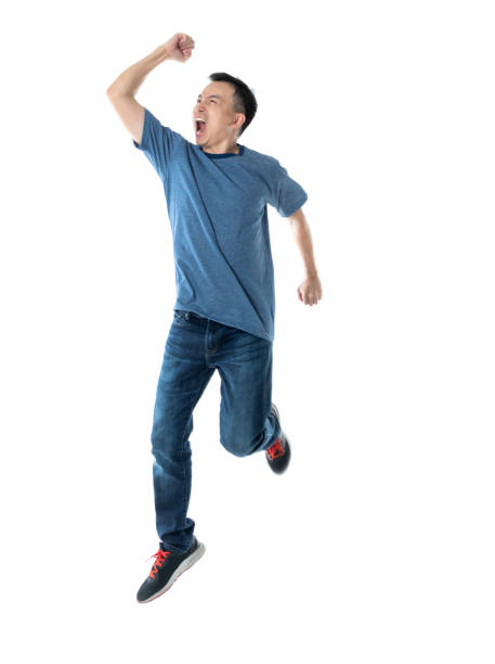 istock Excited man jumping on white background 1220045666