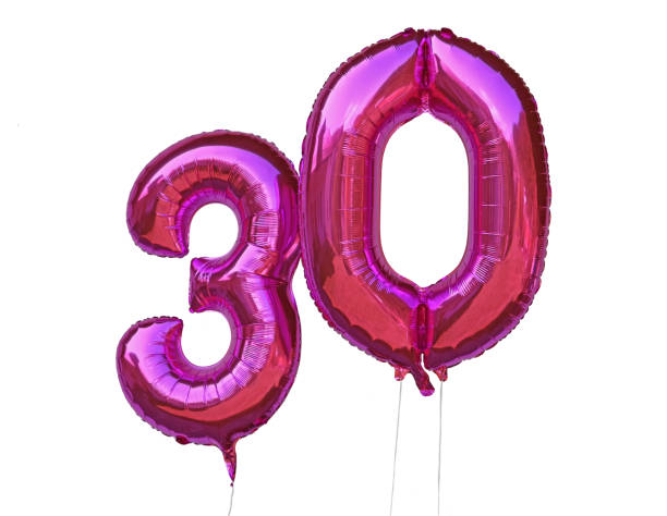 istock pink helium balloons number 30 thirty isolated on white background 1220054360