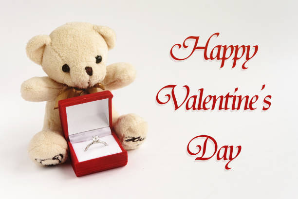 istock stylish luxury ring  and teddy bear,happy valentines day  text, greeting card concept 1220056367
