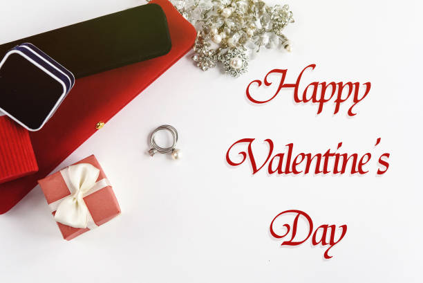 istock stylish luxury accessories and gift boxes, happy valentine's day text, greeting card concept 1220056459