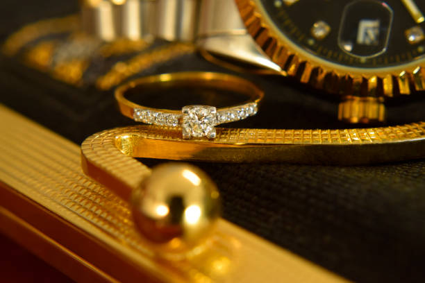 istock jewelry Gold ring set with diamonds Luxurious, expensive 1220057871