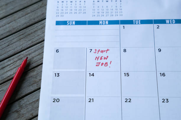istock Start new job, words written on calendar. 1220058000