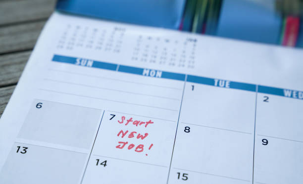 istock Start new job, red words written  on calendar. 1220058019