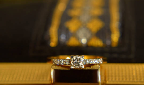 istock jewelry Gold ring set with diamonds Luxurious, expensive 1220058286