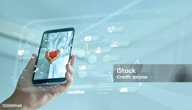 Healthcare Doctor Online And Virtual Hospital Concept Diagnostics And Online Medical Consultation On Smartphone Communication With Patient On Network Innovative And Medical Technology Stock Photo - Download Image Now