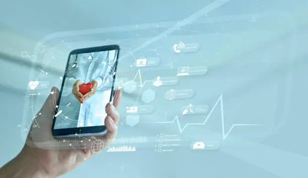 Photo of Healthcare, Doctor online and virtual hospital concept, Diagnostics and online medical consultation on smartphone, Communication with patient on network, Innovative and  medical technology.