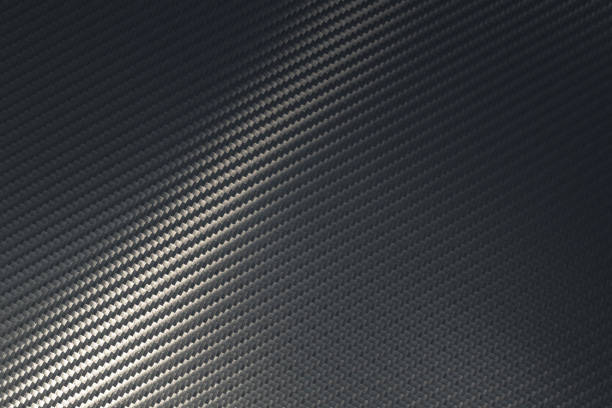 istock Bended surface of grey woven carbon fibre composite sheet. 1220059502