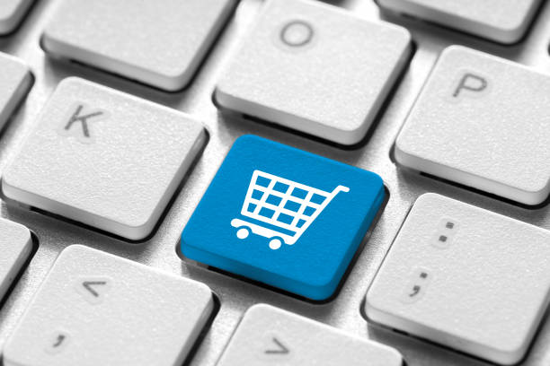 istock Online shopping & business icon on white computer keyboard 1220060395
