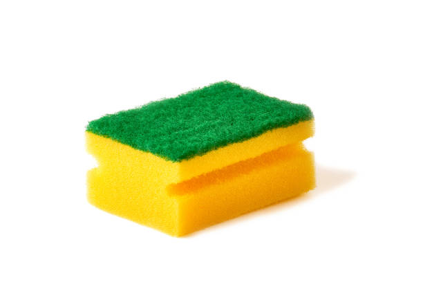 istock yellow dish washing sponge isolated on white 1220061668