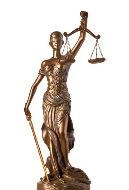 Themis on White Bronze Themis statue - symbol of Justice - isolated on white bronze statue stock pictures, royalty-free photos & images