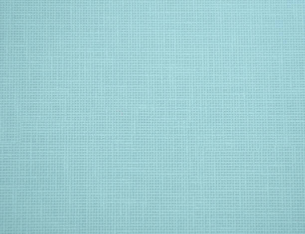 istock A fragment of a cotton fabric with a characteristic pattern, painted in pale blue. 1220065372