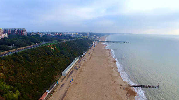 Bournemouth beach and pier in England Bournemouth beach and pier in England -aerial photography boscombe photos stock pictures, royalty-free photos & images