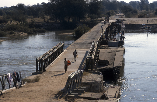 Provisional bridge as a result of the war photographed in 1996 over the Cunene river in southern Angola