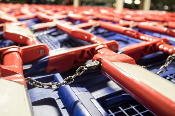 Blue-red shopping carts on a parking. Selective focus