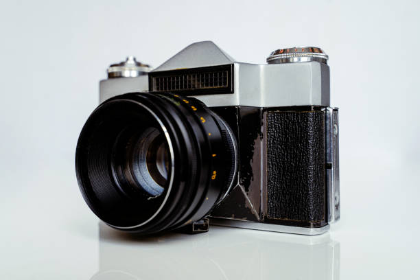 A soviet union camera Zenit E produced in 60s and 80s as an analogue to the German Leica. Very old film camera in shabby shape.