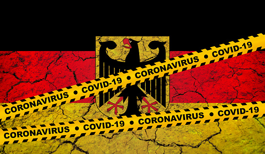 Germany - Pandemic Covid-19 Coronavirus cells flag yellow band danger