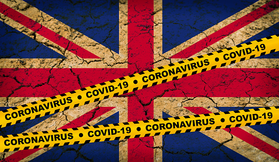 United Kingdom - Pandemic Covid-19 Coronavirus cells flag yellow band danger