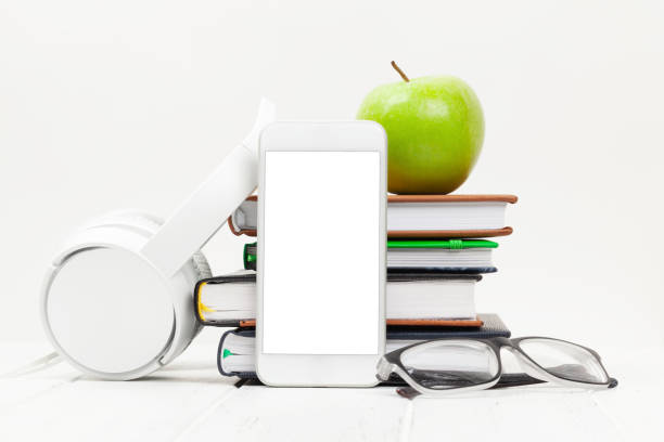 istock Workplace with smartphone, supplies and headphones 1220069793