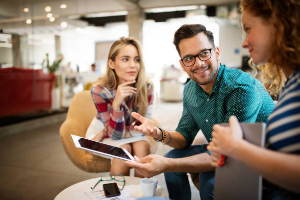 istock Successful company with happy employees in modern office 1220069874