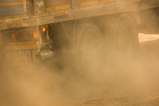istock PM 2.5 from emissions and dust from trucks. 1220070926