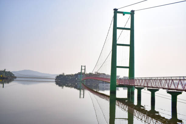 istock A Suspension Bridge on a lake 1220072398