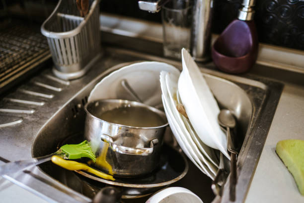 istock Dirty dishes in the sink 1220073540