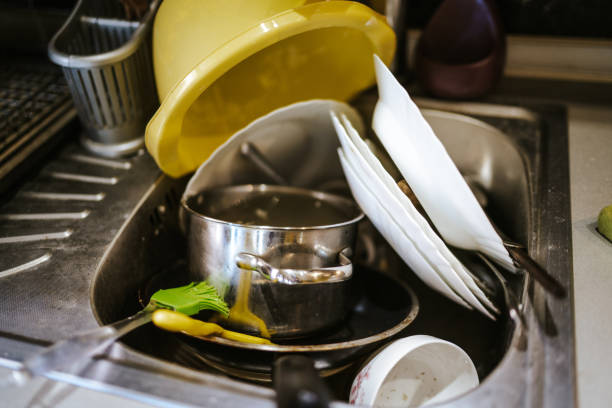 istock Dirty dishes in the sink 1220074744
