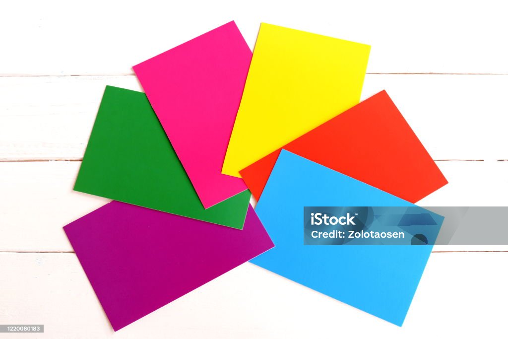 A Set Of Bright Colored Cardboard Sheets Isolated On A White Background Red  Yellow Green Blue Purple Pink Carton Sheets Colored Cardboard Paper For  Kids Craft Projects Stock Photo - Download Image