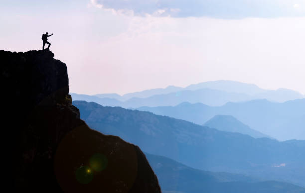istock high mountains, summit success and target adventure 1220082212