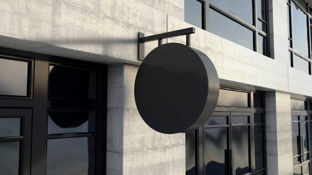 istock Round Black Sign Outside Shop Facade 1220082336