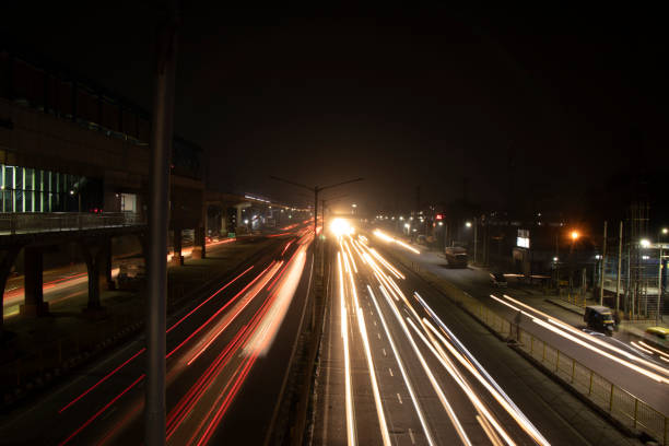 istock Speed Traffic light trails on highway, long exposure, urban background and dark sky 1220083353