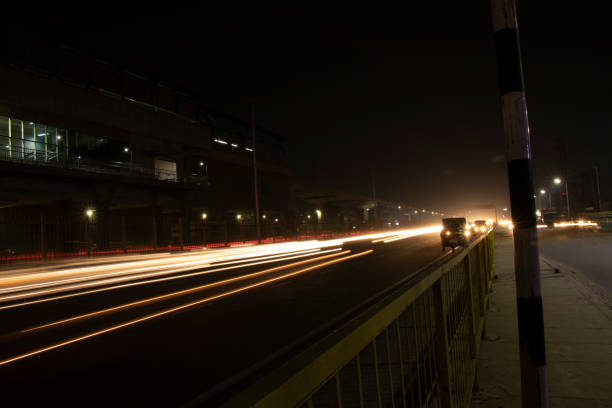 istock Speed Traffic light trails on highway, long exposure, urban background and dark sky 1220083413