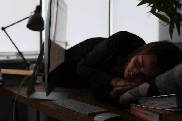 istock Exhausted businesswoman fell asleep 1220083670